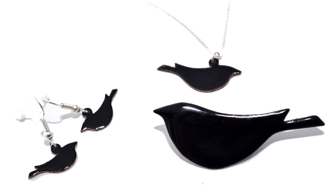 black brooch, necklace and earrings of Migrating Birds