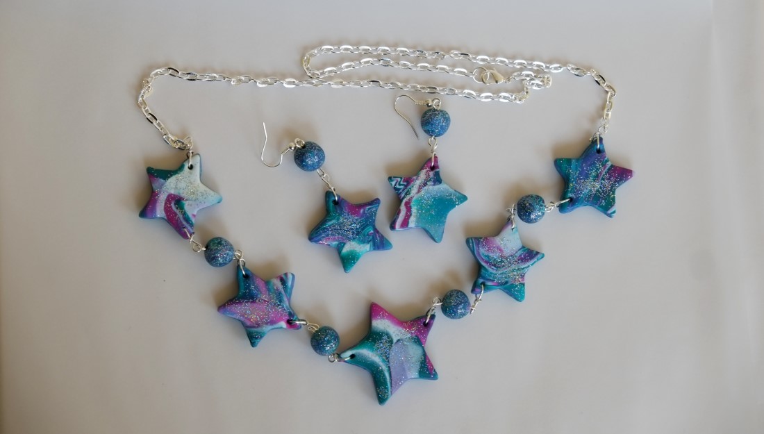 star polymer clay shapes on necklace and earrings