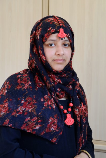 participant wearing her hand made tikka and necklace